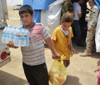 Distribuição de ajuda alimentar no Iraque. Foto: PMA/Mohammed Al Bahbahani