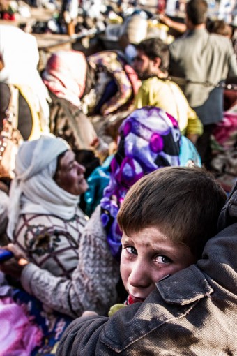 Refugiados de Kobane escapam aos ataques do Estado Islámico. Foto: Belga Zumapress / Sebastian Backhaus 