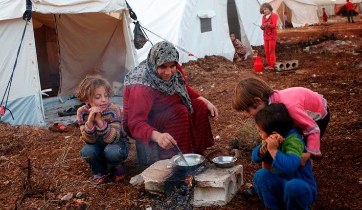 Tragédia de refugiados sírios vista da Turquia